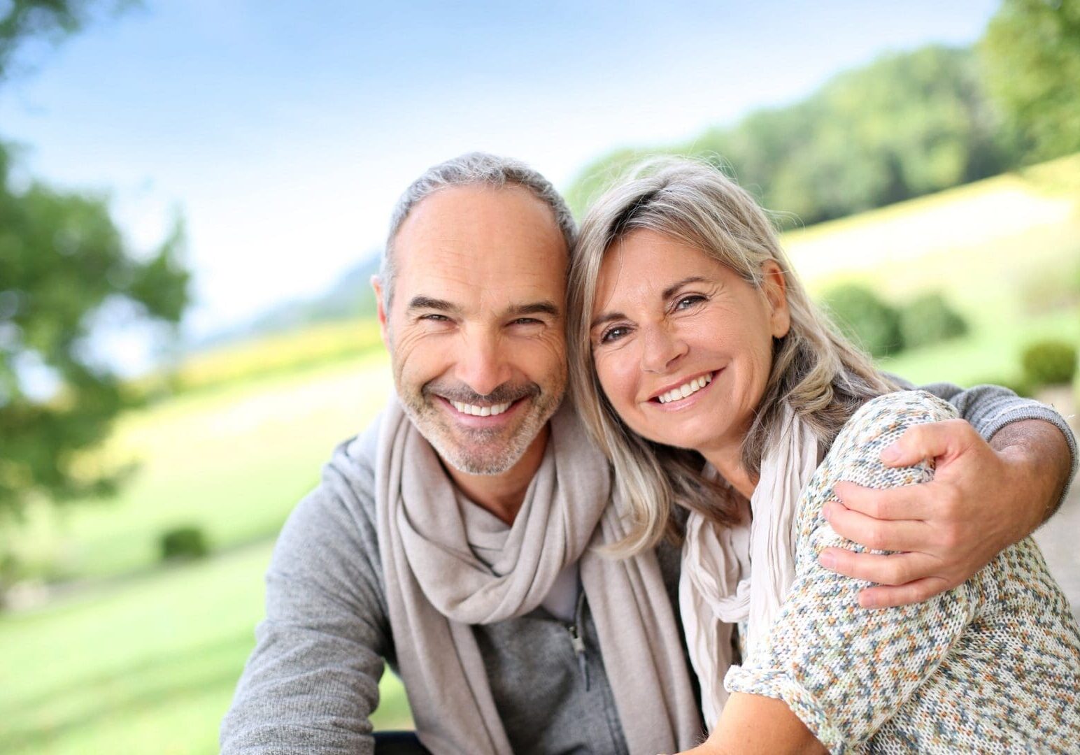 A man and woman smiling for the camera.